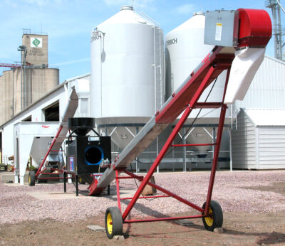 Receiving treated seed and loading out to seed tenders.