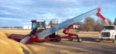 40 foot inclined conveyor with 16 foot wide folding scoop auger
