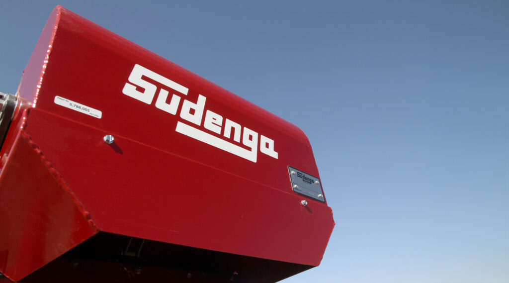 A closeup of the spout of a Sudenga Portable Drive Over Hopper